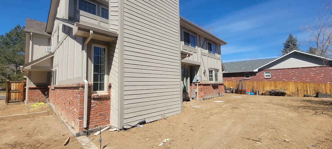 Outdoor living space, garage addition, primary suite walk out deck